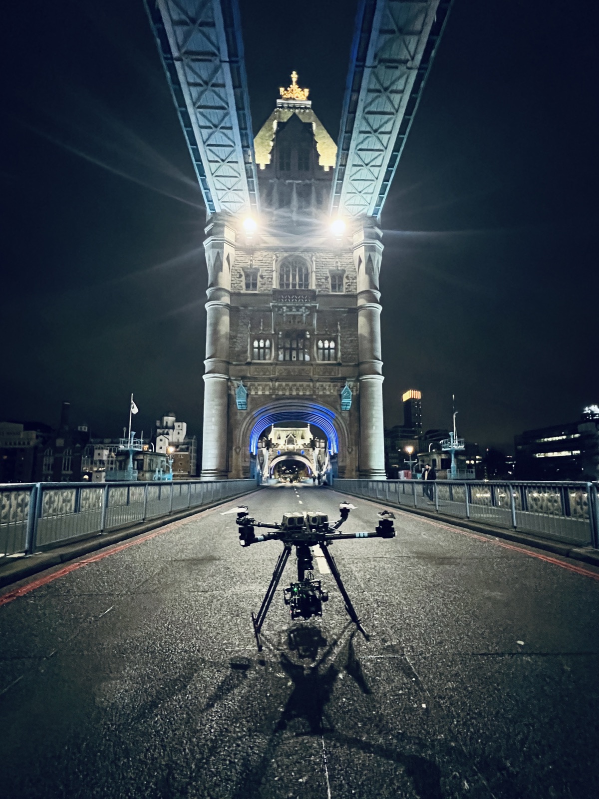 Cinema drone on Tower Bridge in London at night